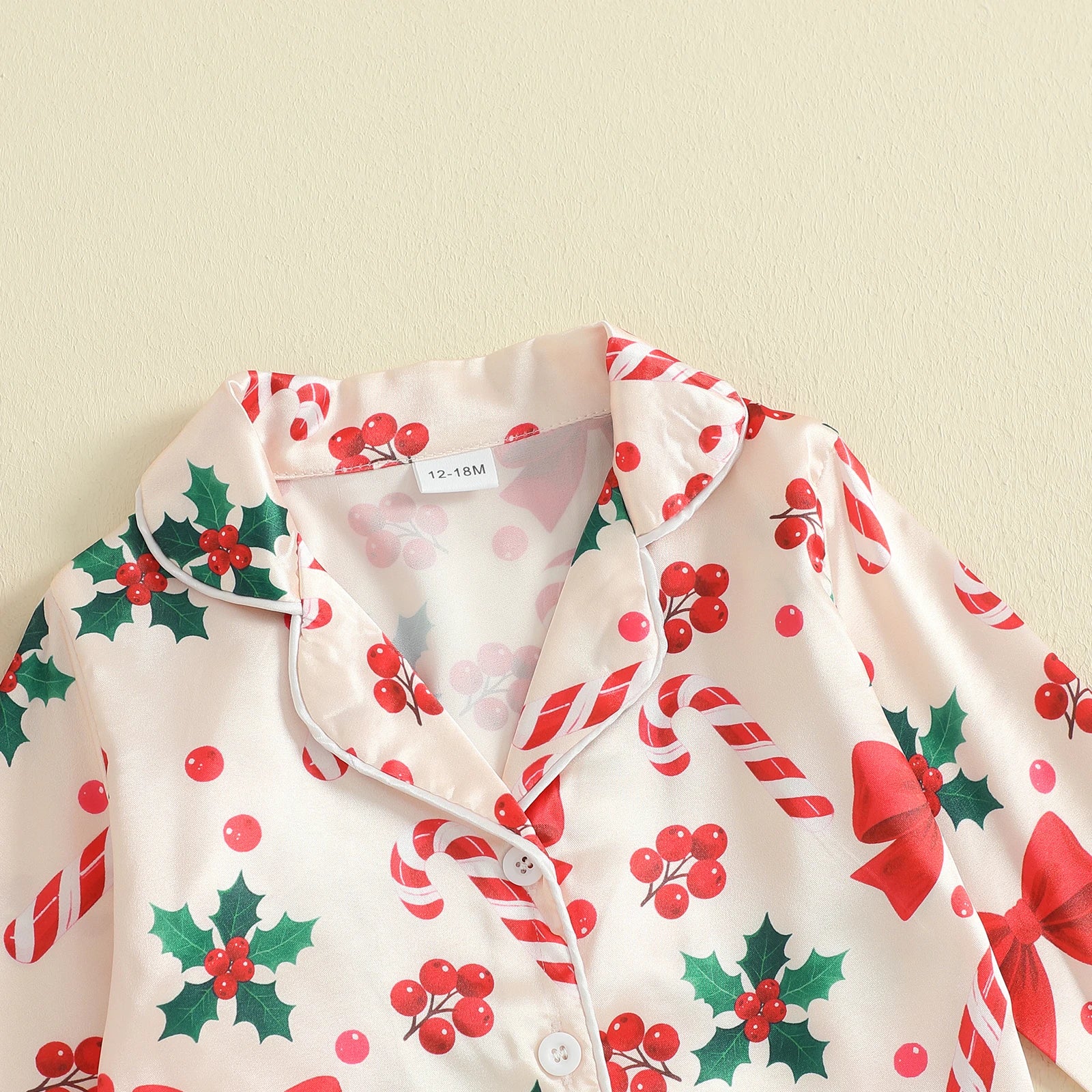 Christmas Magic Pajamas with Candy Cane & Holly Details